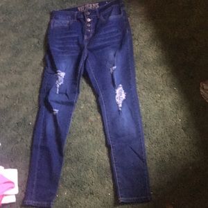 Distressed blue jeans